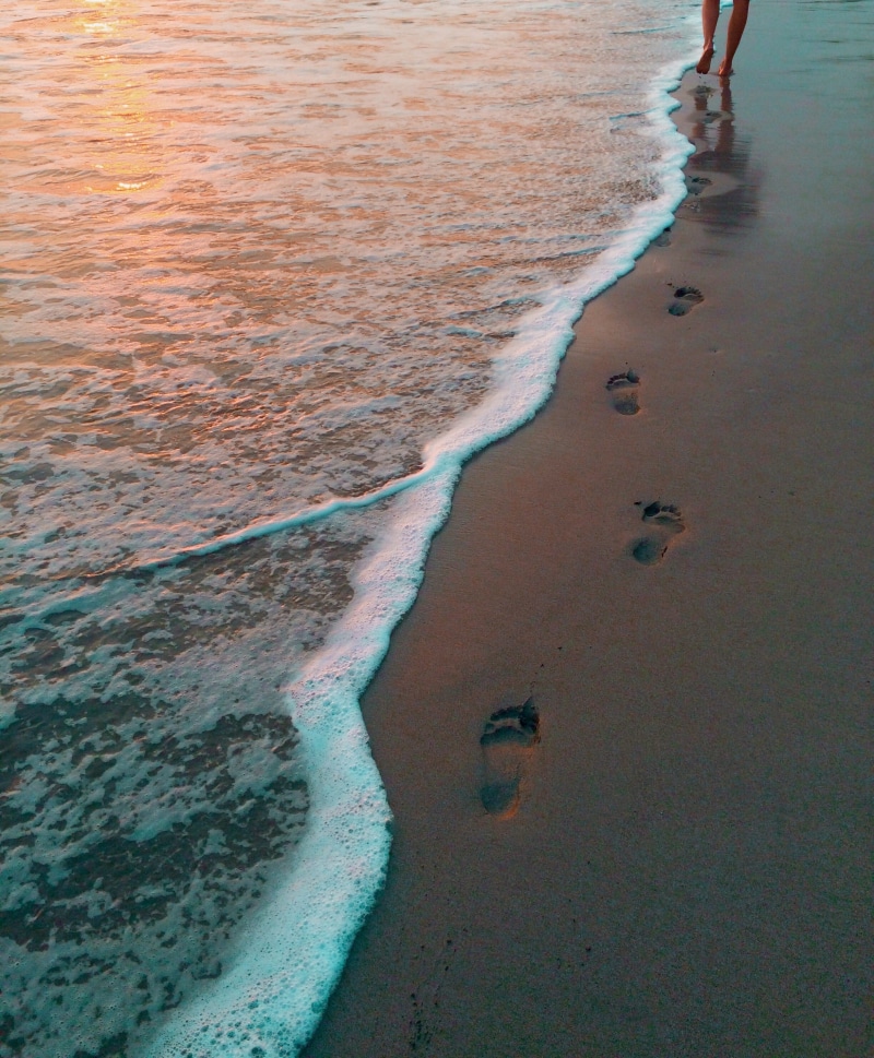 day, beauty in nature, footstep, real people, surfing, land, lifestyles, warm, water, aquatic sport, beach, sport, sea, high angle view, tranquility, person