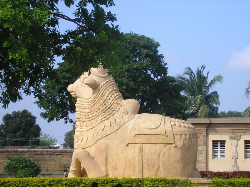 vehicle, asia, heritage, plant, bull, nandi, craft, nature, building, representation, hinduism, outdoors, low angle view, human representation, lord, sky
