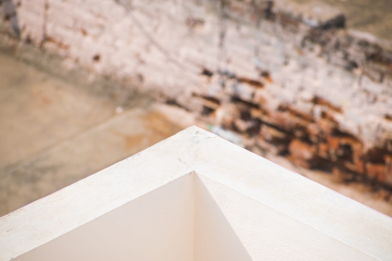 concrete, coimbatore, 5K, focus on foreground, letter, shape, outdoors, close-up, wall - building feature, high angle view, india, wall, still life, built structure