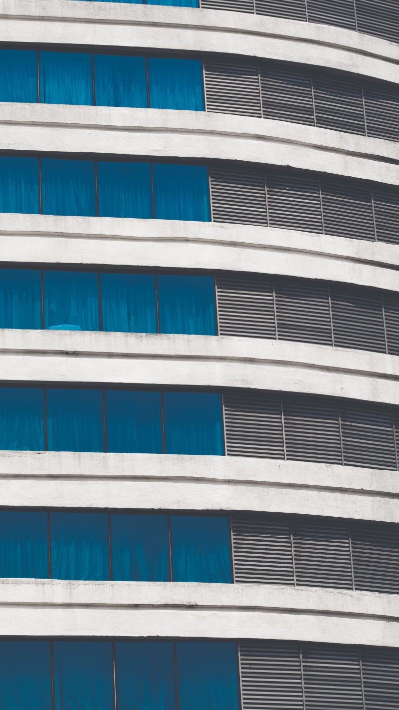 outdoors, in a row, building exterior, full frame, gray, glass - material, day, architecture, city, abstract, blue, india, residential district, low angle view