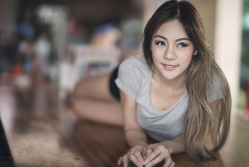 long hair, beautiful woman, beauty, indoors, looking at camera, focus on foreground, one person, adult, casual clothing, Thailand, happiness, hair, teenager