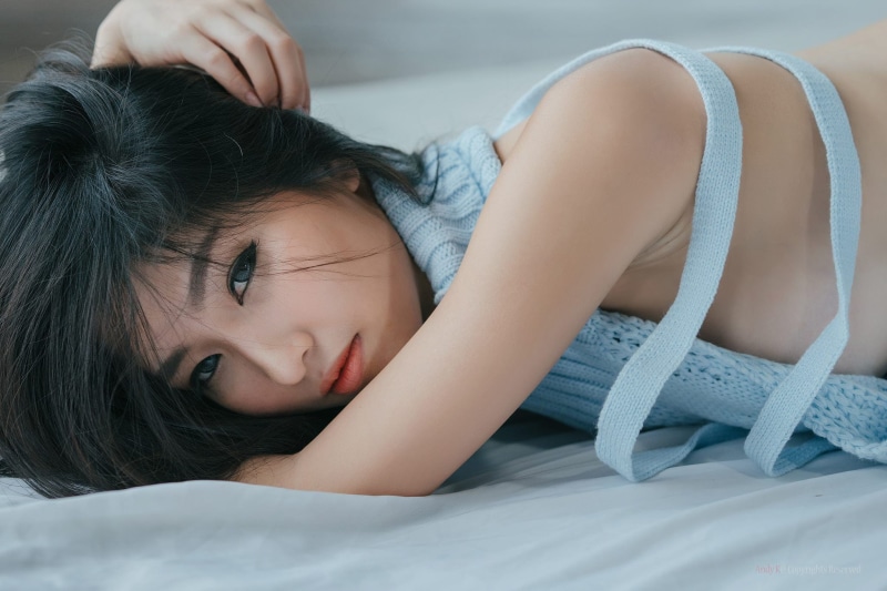 emotion, indoors, innocence, relaxation, Atita Wittayakajohndet, sweater, childhood, females, one person, lying down, furniture, portrait, offspring, Asian