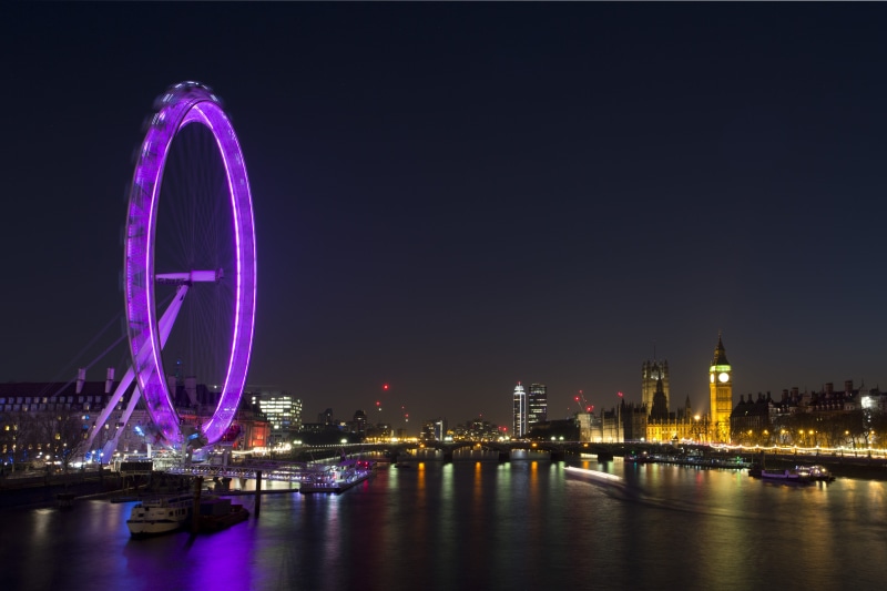 water, nighttime, sky, london eye, urban, ferrys, bridge, motion, amusement park ride, cityscape, illuminated, yacht, boat, landmark, tower, evening, purple