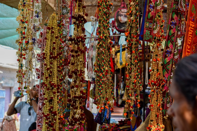 retail, shopkeeper, shopping, decorative items, variation, navratri, 5K, group of people, consumerism, real people, market stall, art and craft, adult
