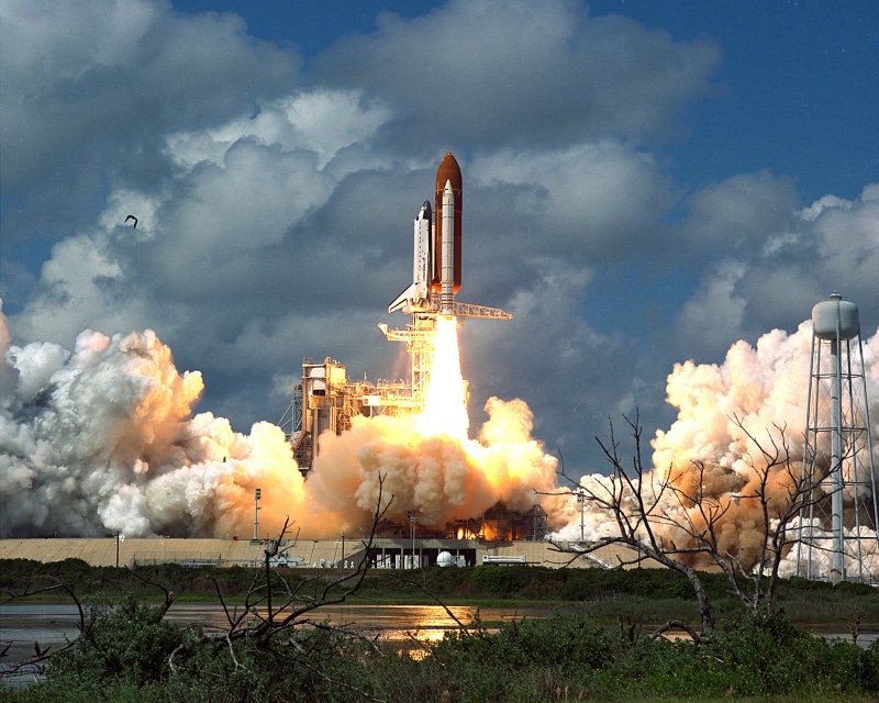 factory, smoke - physical structure, industry, flight, blast off, exploration, building exterior, environmental issues, discovery space shuttle, technology