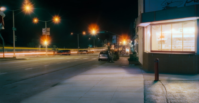 building exterior, cinestill, streetlight, lightstreaks, built structure, hasselblad 503cw, light beam, pizza, hasselblad, 2K, film, 503cw, on the move
