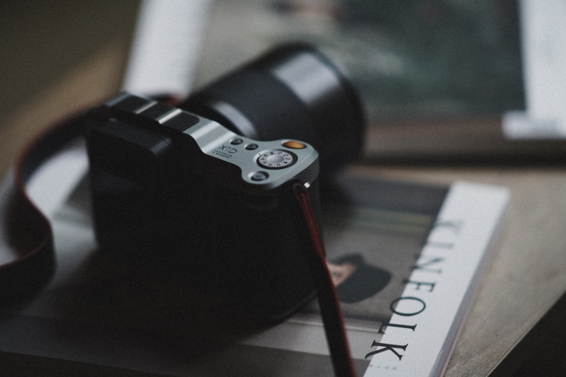 black color, communication, wheel, computer, camera, wireless technology, finger, strap, no people, gun, aggression, computer hardware, hasselblad, hardware
