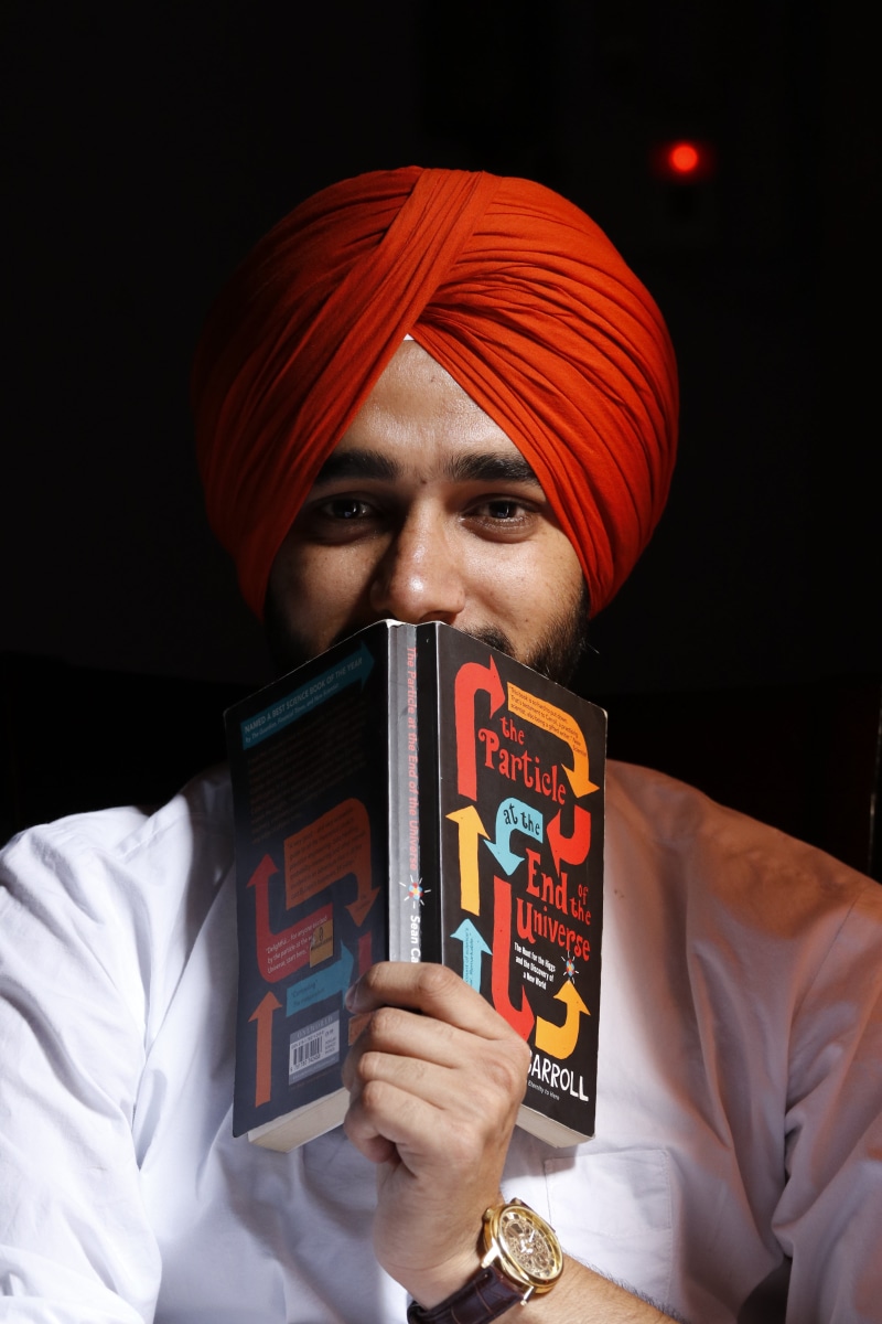 religious, punjabi, studio, shoot, young adult, turban, watch, book, male, colorful, lifestyles, culture, face, one person, young, looking at camera, man