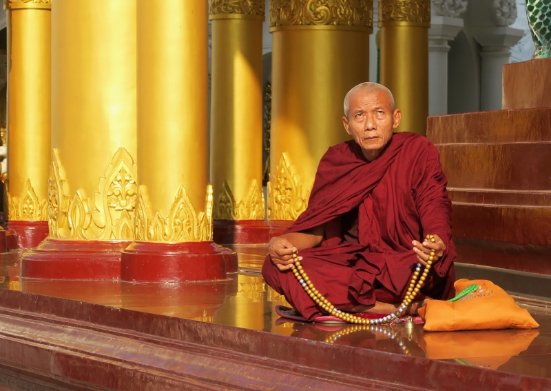 sitting, temple, architecture, myanmar, golden, shwedagon, men, real people, buddhism, one person, rosary beads, sacred, shwedagon pagoda, robes, pagoda