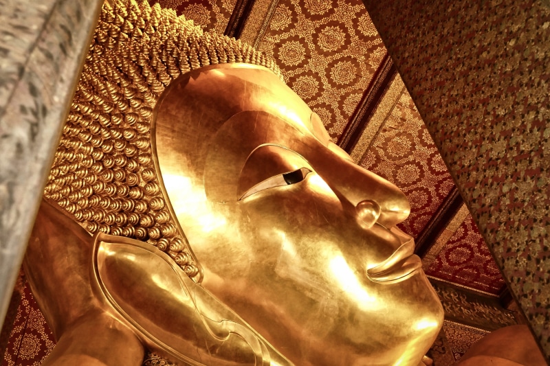 statue, tourism, male likeness, reclining buddha, architecture, place of worship, gold colored, belief, art and craft, no people, creativity, wat, craft