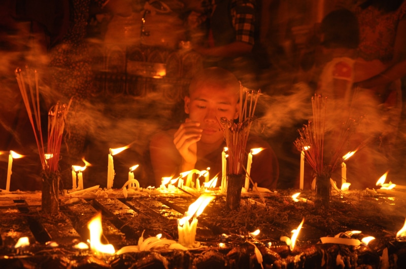 Yangon, buddhist monk, childhood, heat - temperature, leisure activity, Burma, real people, Buddhism, light festival, glowing, fire - natural phenomenon