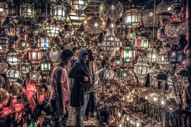 shopping, lifestyles, morocco, retail display, eyes, zoco, real people, marrakesh, built structure, illuminated, for sale, decoration, marruecos, group of people