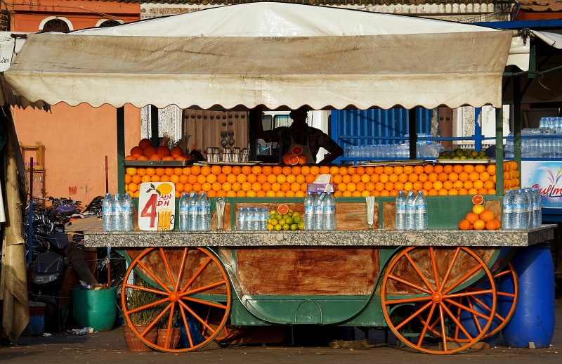 4K, seller, food, for sale, small business, orange, built structure, cart, wheel, day, morocco, building exterior, retail, container, architecture, market