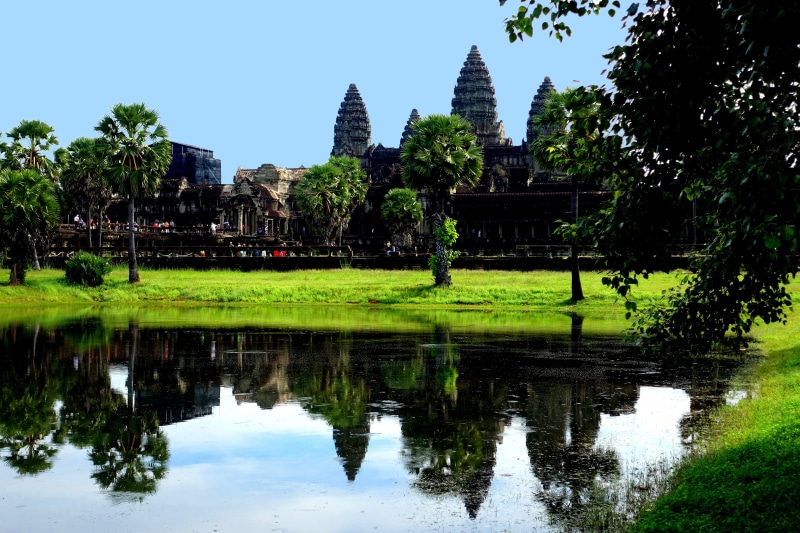 built structure, reflection, asia, angkor wat, travel destinations, waterfront, tree, water, religion, belief, history, temple complex, 5K, nature, spirituality