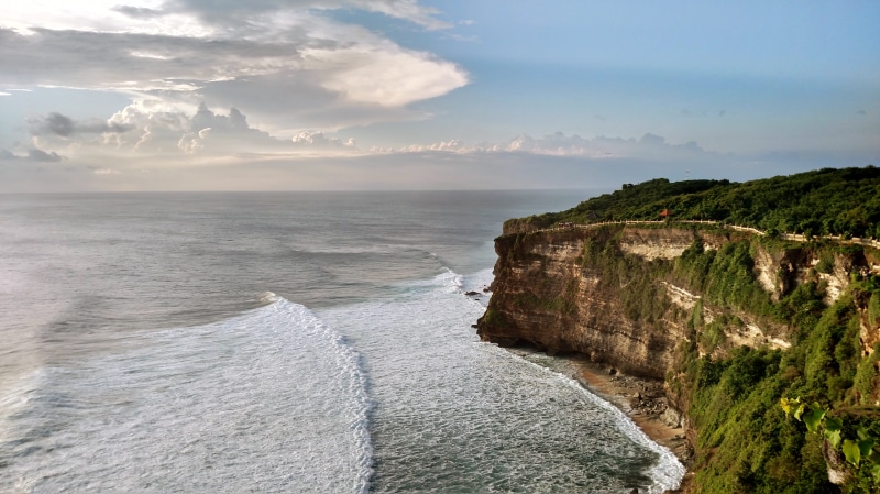 tranquil scene, non-urban scene, no people, solid, vacation, paradise, holiday, land, beach, nature, indonesia, ocean, cloud - sky, outdoors, water, rock