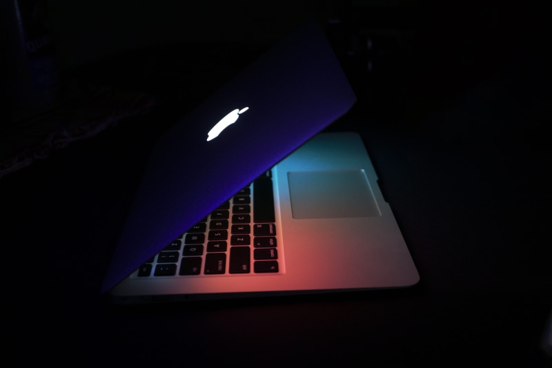 illuminated, macbook, indoors, dark, studio shot, architecture, darkroom, multi colored, red, electronics, computer equipment, colours, keyboard, communication
