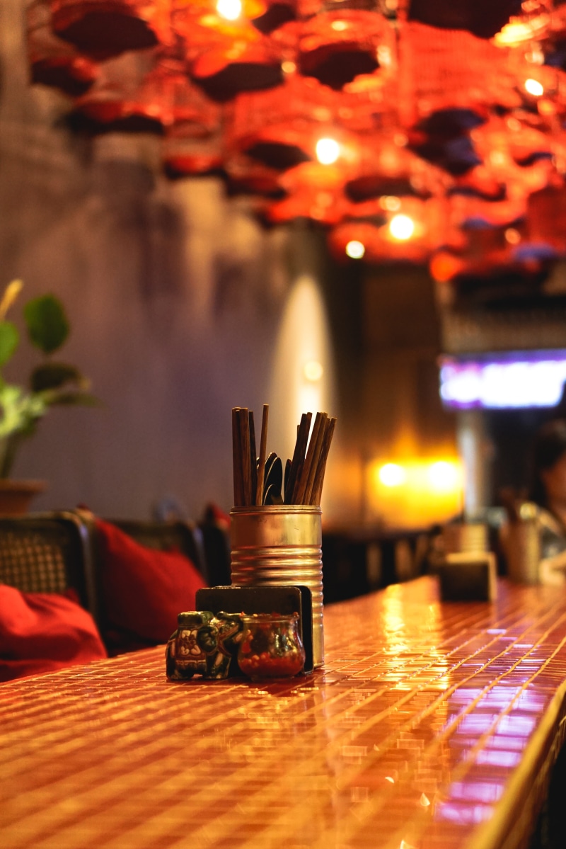 light, selective focus, decoration, 5K, glowing, container, vietnam, no people, glass, focus on foreground, saigon, lighting equipment, vietnamese, red