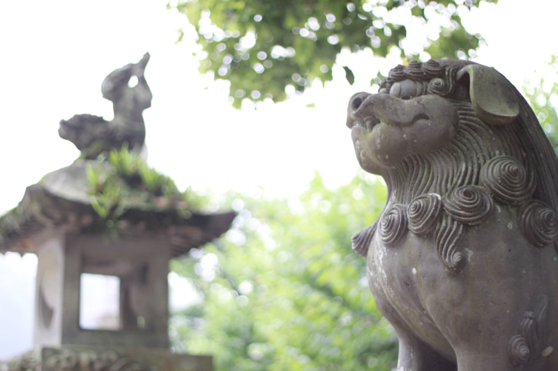 art and craft, outdoors, dazaifu, creativity, close-up, religion, sculpture, belief, built structure, guardian lion-dog at shinto shrine, history, ornate