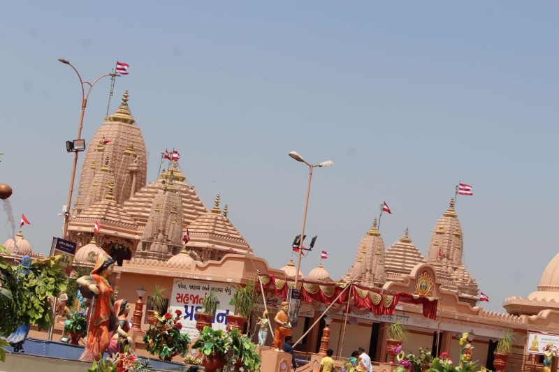 history, built structure, clear sky, day, maddir, building exterior, no people, plant, mandir, spire, building, surat, background, place of worship, natural