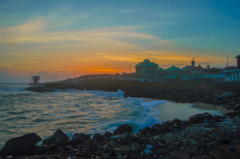solid, beauty in nature, architecture, building exterior, rock, land, sunset, 5K, nature, sea, cloud - sky, kanyakumari, waves, rock - object, no people