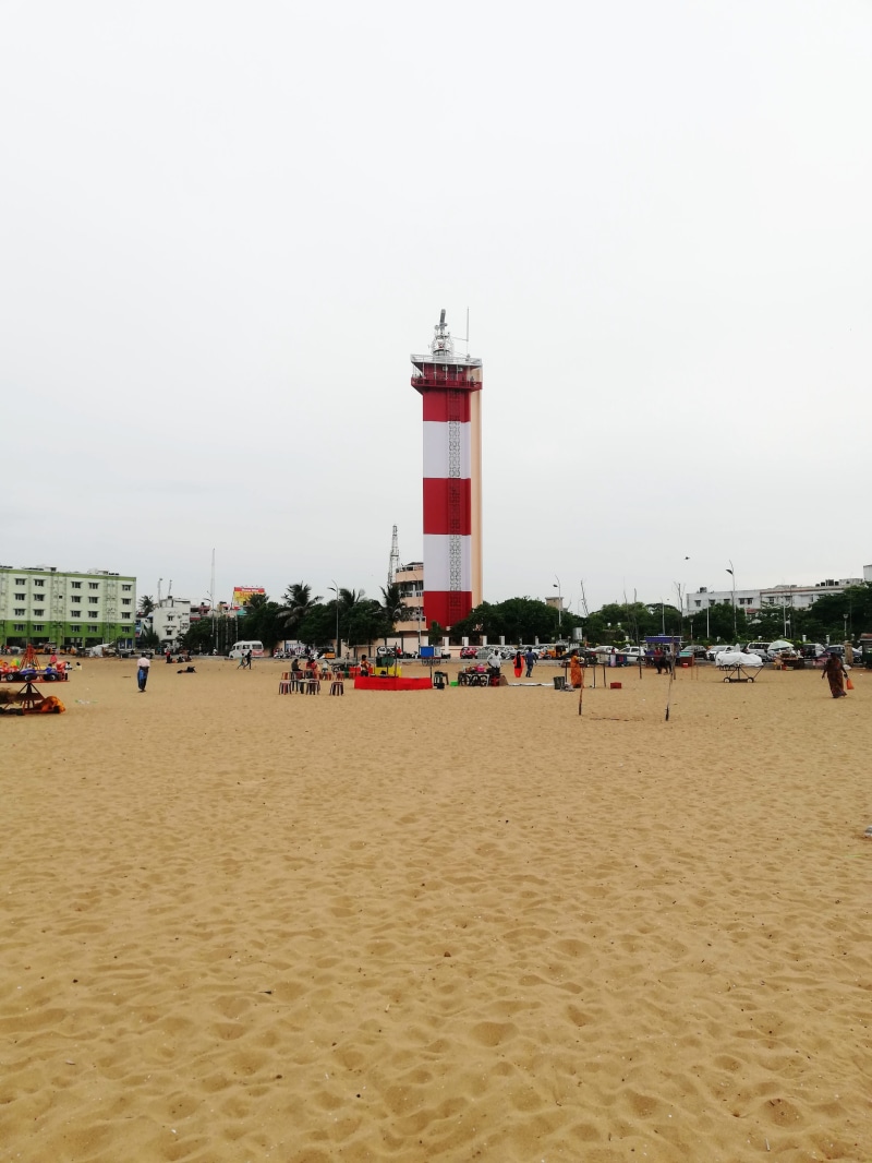 direction, building exterior, madras, sky, sand, land, water, building, chennai marina lighthouse, nature, india, clear sky, protection, guidance, marina