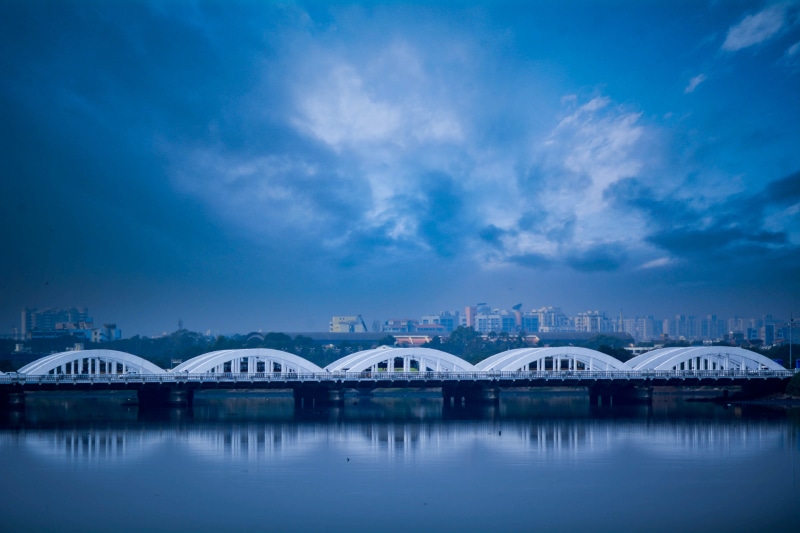 bridge, urban skyline, blue, skyscraper, office building exterior, architecture, no people, panoramic, cloud - sky, reflection, building exterior, built structure