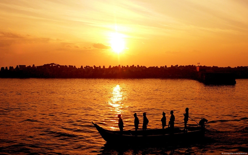 sunlight, windows, beauty in nature, tranquility, sunset, tranquil scene, sky, mode of transportation, real people, beach, chennai, water, wall, cloud - sky