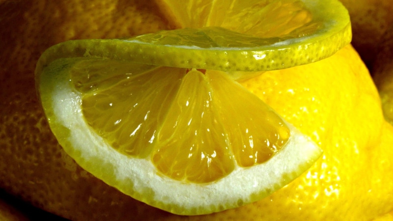 indoors, wellbeing, close-up, lemons, sour taste, macro, food and drink, food, focus on foreground, freshness, ripe, slice, juicy, citrus fruit, lemon