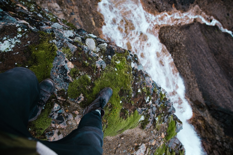moss, dangling, Outdoors, beauty in nature, Rock, water, solid, feet, jeans, Waterfall, low section, View, day, nature, grown, hiker, shoes, cliff, background