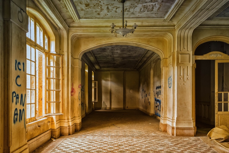 direction, lighting equipment, leave, tiled floor, history, arch, building, nostalgia, hotel, closed, mood, door, brown, wall - building feature, window