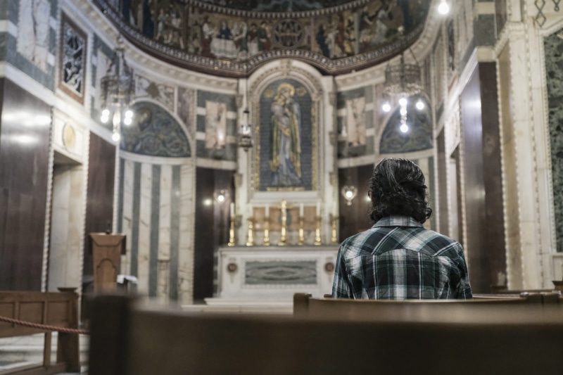 church, architecture, built structure, altar, belief, flooring, banister, headshot, restaurant, place of worship, person, shrine, building, adventure, bench