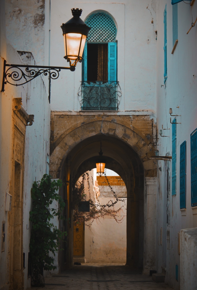 lamp, walkway, architecture, home decor, tunis, wall - building feature, lighting equipment, light, door, building, ruined, no people, dusk, corridor, arabic