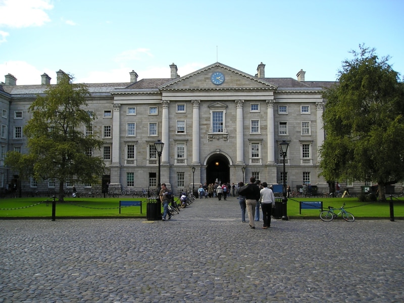 adult, city, outdoors, built structure, women, college, trinity college, building exterior, cathedral, building, group of people, ireland, tree, day, plant