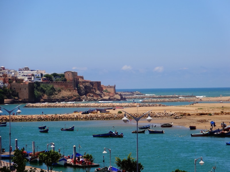 sea, crowd, mode of transportation, transportation, coast, 2K, architecture, africa, daytime, outdoors, rabat, landscape, water, building exterior, capital