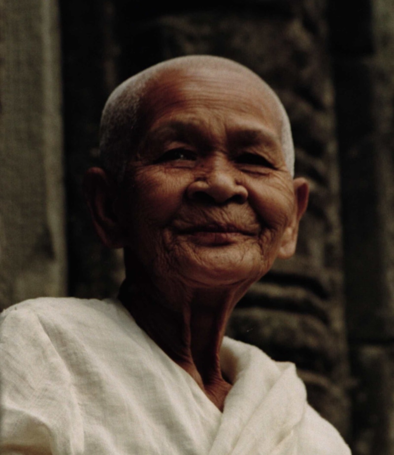 lifestyles, contemplation, bayon temple, senior women, serenity, religion, relaxation, human face, traditional dress, old smiling woman, headshot, leisure activity