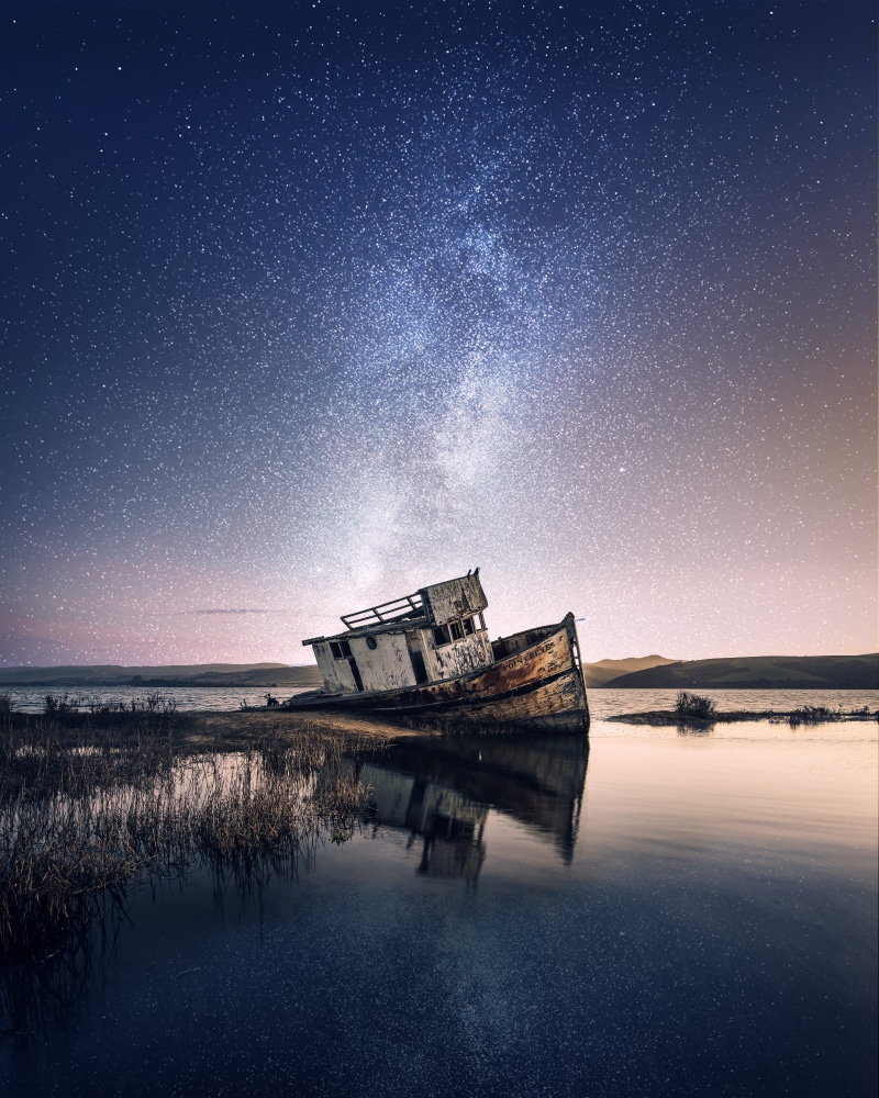 ship, run-down, star - space, background, sea, beauty in nature, evening, sunset, reflection, no people, watercraft, space and astronomy, galaxy, grass