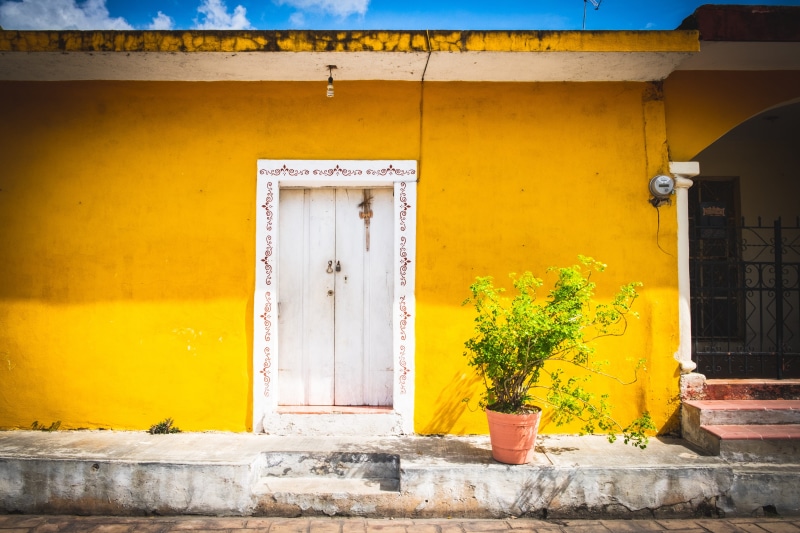 architecture, church, closed, security, residential district, outdoors, religion, no people, vacation, izamal, yucatan, plant, potted plant, house, america