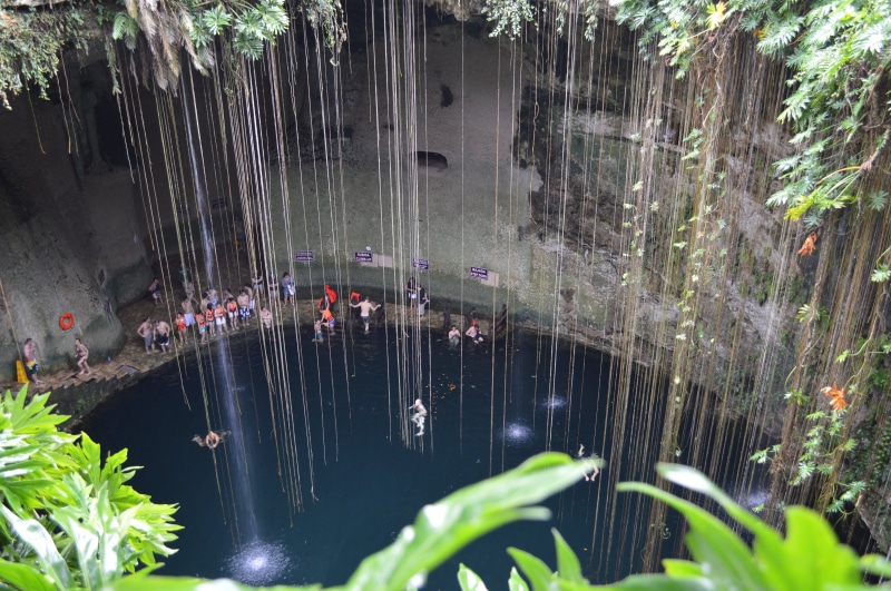 mexico, real people, tree, water, well, plant part, architecture, day, leaf, women, cenote, plant, 4K, nature, building exterior, outdoors, growth, reflection