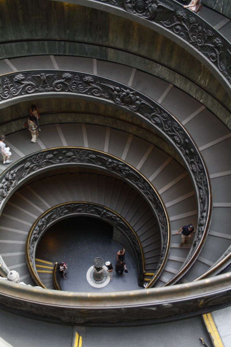 directly above, indoors, day, spiral, architecture, men, spiral staircase, lifestyles, staircase, tourism, steps and staircases, italian, museum, rome