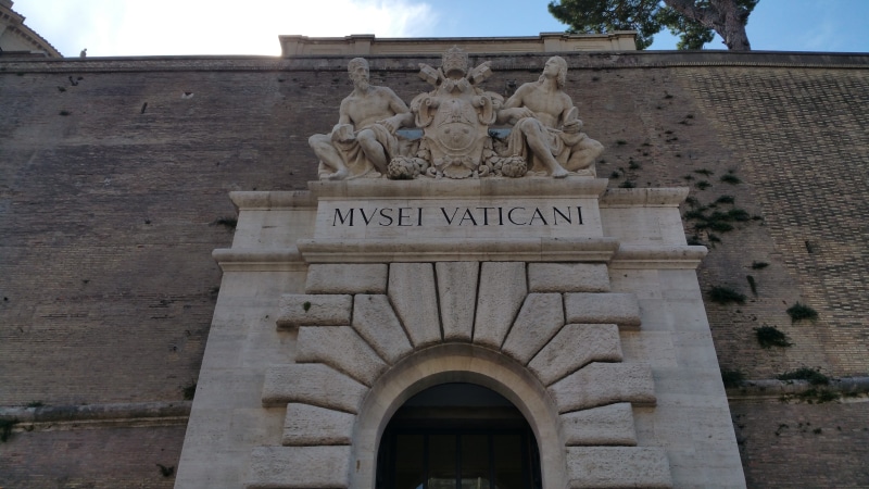 building, Museum, vatican, outdoors, travel destinations, arch, Vatican, rome, text, history, human representation, sculpture, Vatican Museum, male likeness