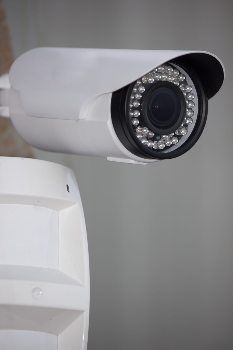 white, camera, passive, photographing, photography themes, infra, black, focus on foreground, security, lens - optical instrument, cctv, red, indoors, modern