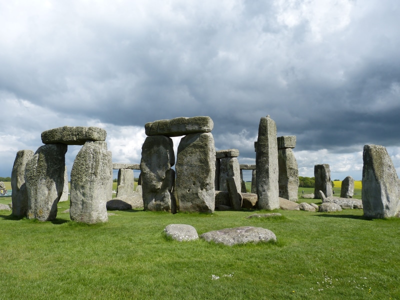 grass, stone material, united kingdom, ancient civilization, ruined, archaeology, tourism, old ruin, storm mood, ancient, sky, travel, cemetery, no people