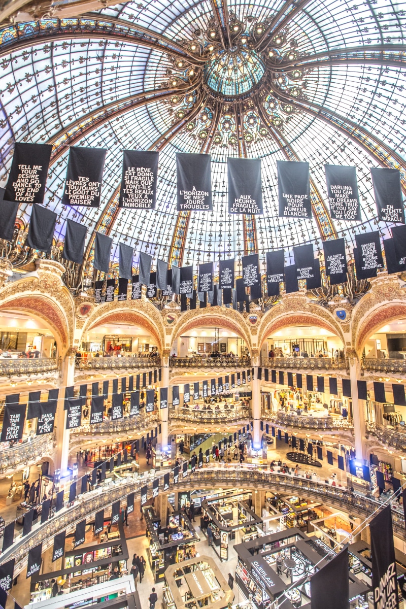 tourism, built structure, person, travel, galleries, fashion, religion, illuminated, france, outdoors, galleria, architectural feature, human, paris, place of worship
