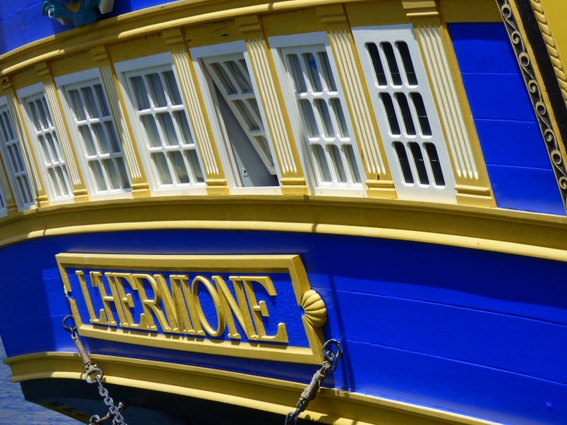 facade, built structure, lafayette, yellow, wharf, ocean, city life, small group of objects, day, no people, low angle view, stern, three-masted, wood