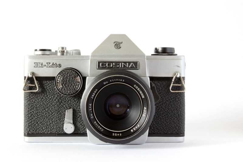 photographer, retro styled, single object, photograph, analog, technology, close, film, black color, slr camera, cut out, indoors, photo, recording, photographic equipment