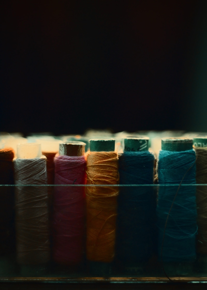 textile, multi colored, sewing item, stack, 4K, indoors, lahore, clothes, yarn, sewing, large group of objects, side by side, spool, studio shot, variation