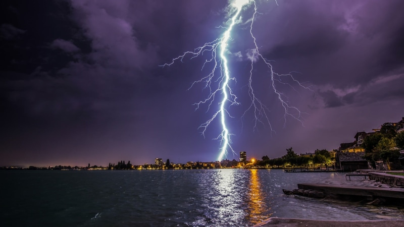cloud - sky, building exterior, forked lightning, city, phenomenon, cloud, night, architecture, lightning, beauty in nature, evening, landscape, power