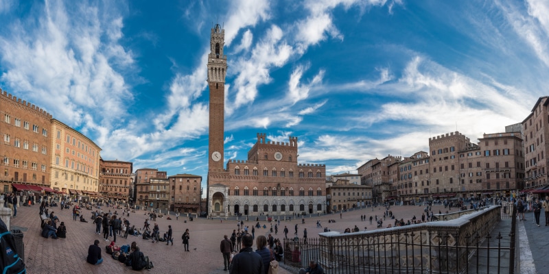 large group of people, group of people, building, landmark, architectural column, architecture, outdoors, places of interest, building exterior, real people