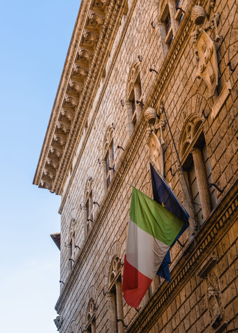 building exterior, italian flag, sky, lookup, craft, built structure, europe, italy, the past, building, old, representation, siena, architecture, outdoors