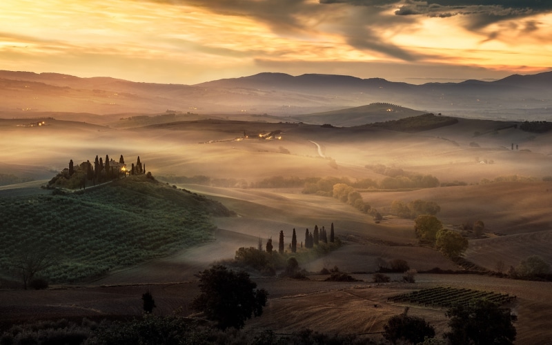 tranquil scene, fog, clouds, field, no people, Italy, sunset, scenics - nature, cloud - sky, environment, plant, Tuscany, tranquility, outdoors, hills